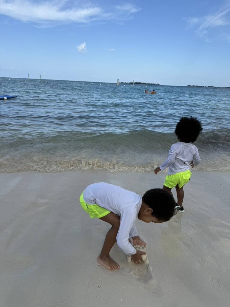 The boys playing at the water's edge on Cable Beach shortly after arriving